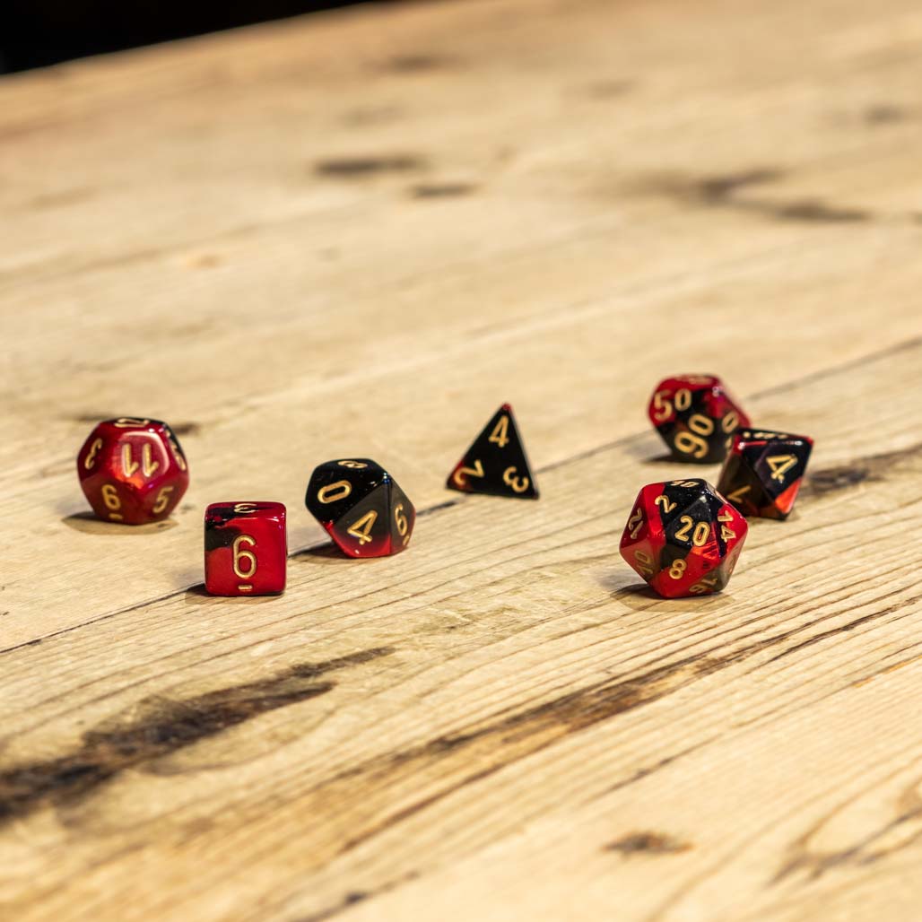 Chessex #26433 - Gemini Black-Red / Gold Polyhedral (7ct)