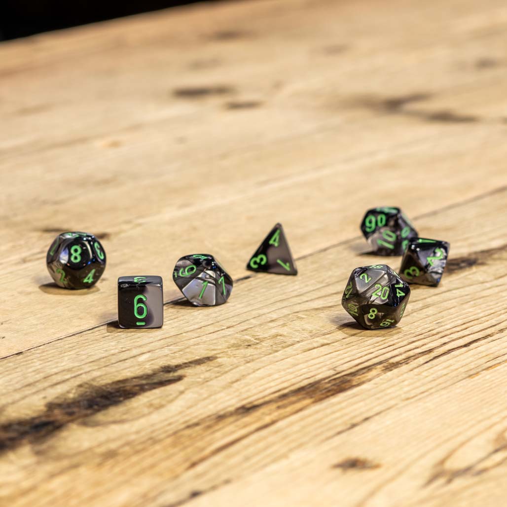 Chessex #26445 - Gemini Black-Grey / Green Polyhedral (7ct)