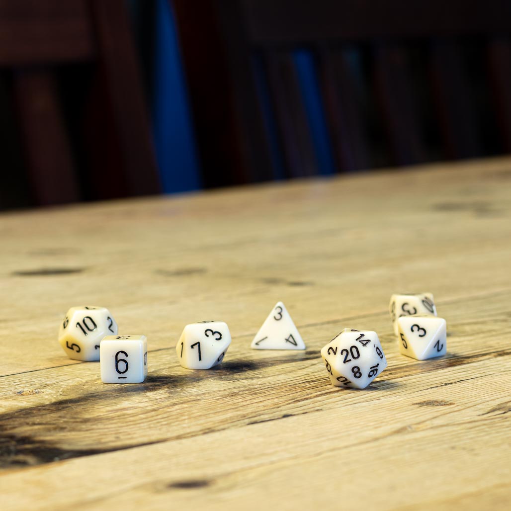 Chessex #25400 - Opaque Ivory / Black Polyhedral (7ct)