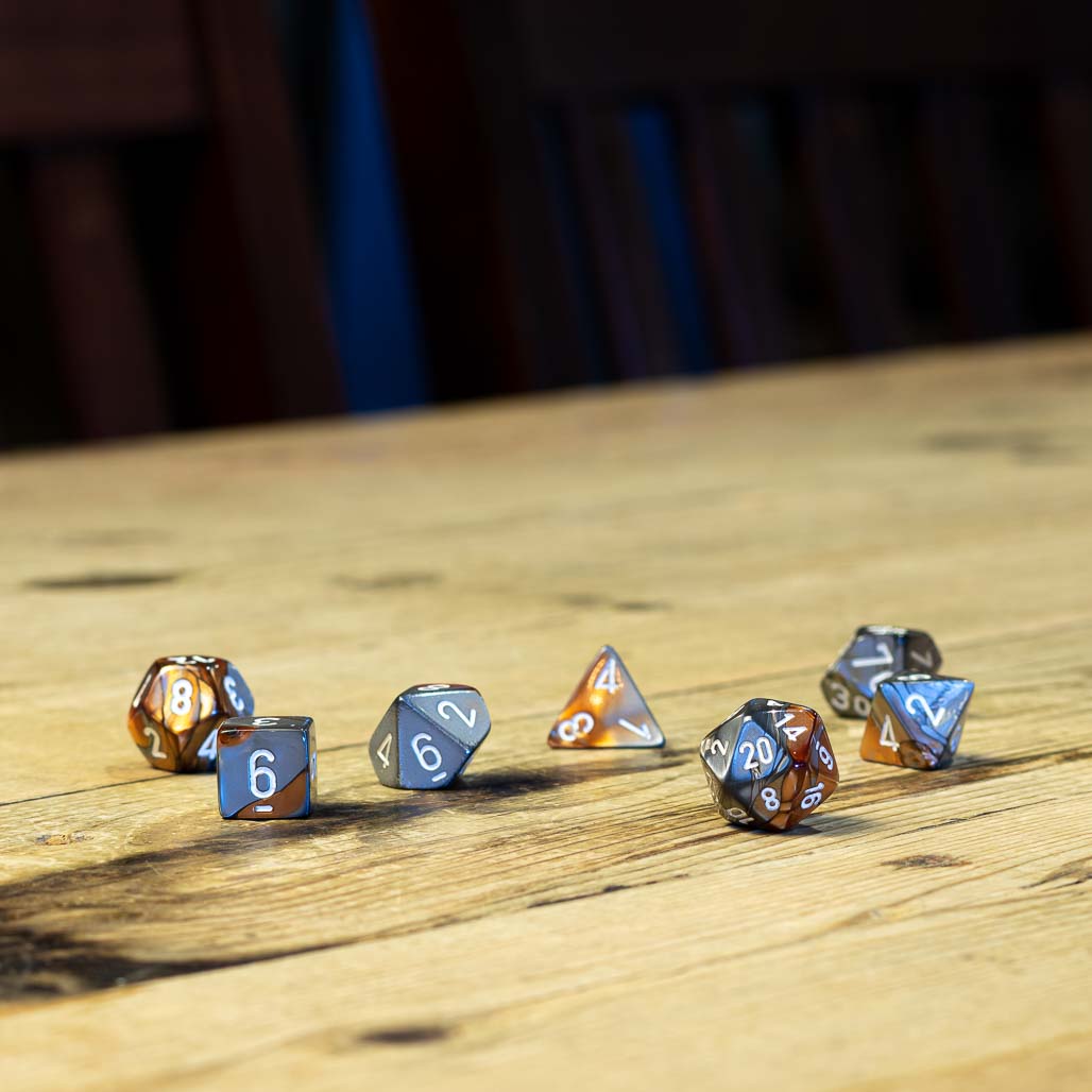 Chessex #26424 - Gemini Copper-Steel / White Polyhedral (7ct)
