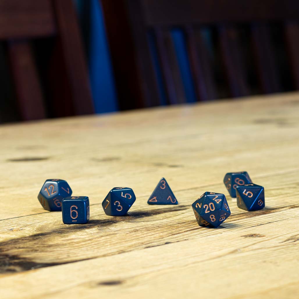 Chessex #25426 - Opaque Dusty Blue / Copper Polyhedral (7ct)