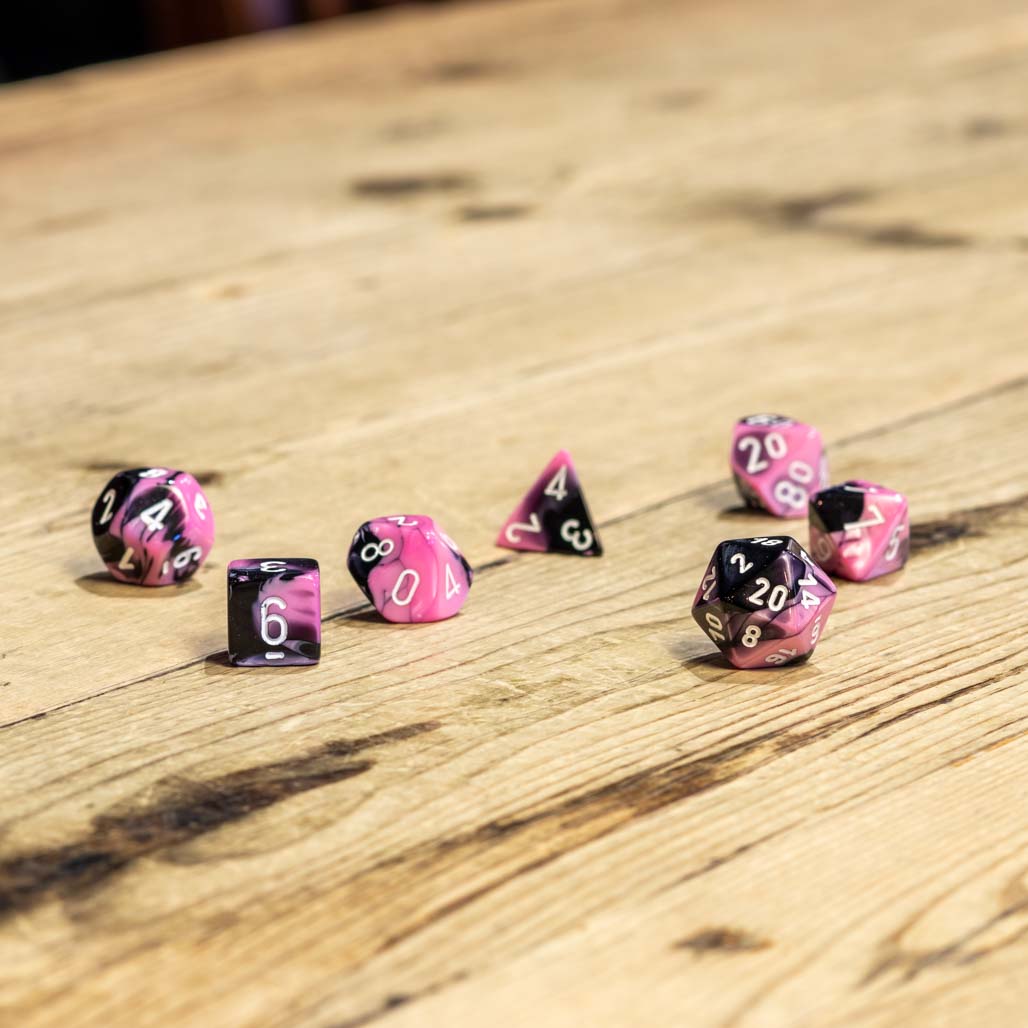 Chessex #26430 - Gemini Black-Pink / White Polyhedral (7ct)