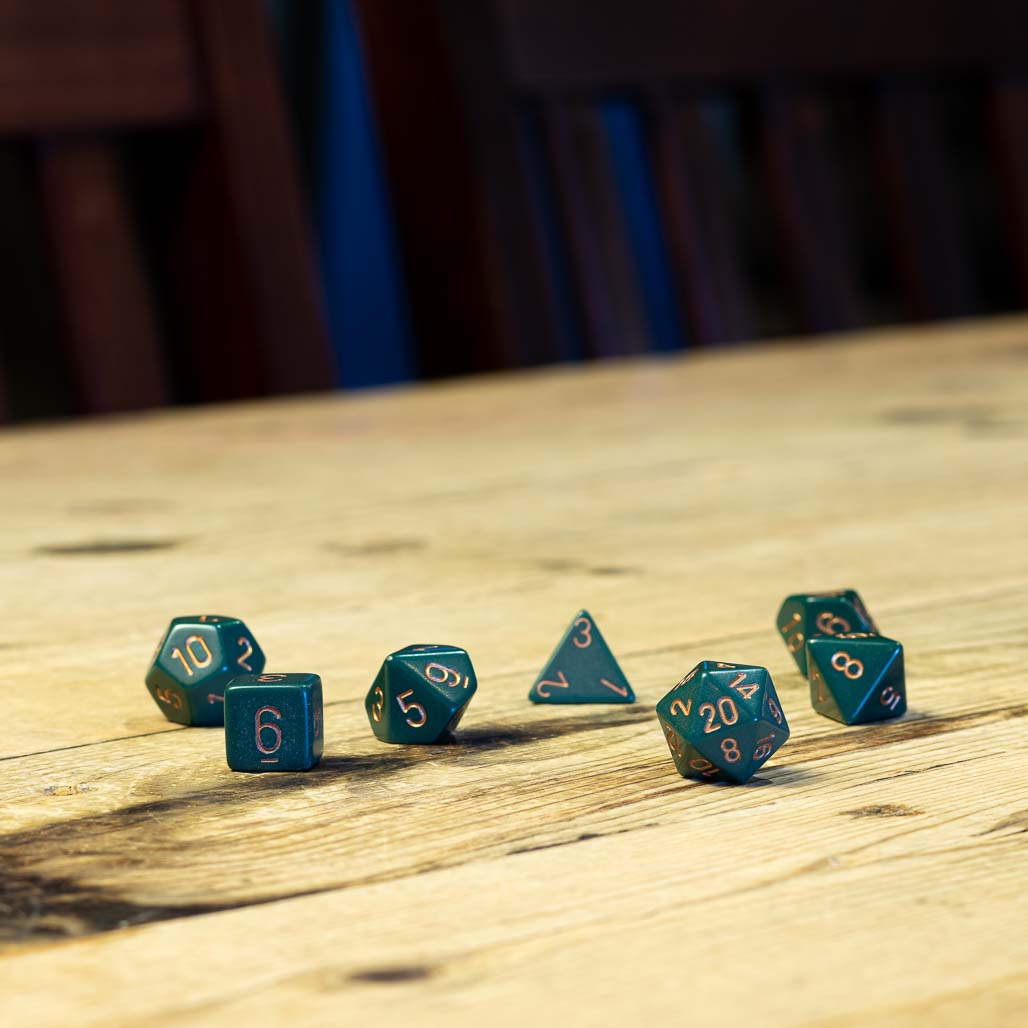 Chessex #25415 - Opaque Dusty Green / Copper Polyhedral (7ct)