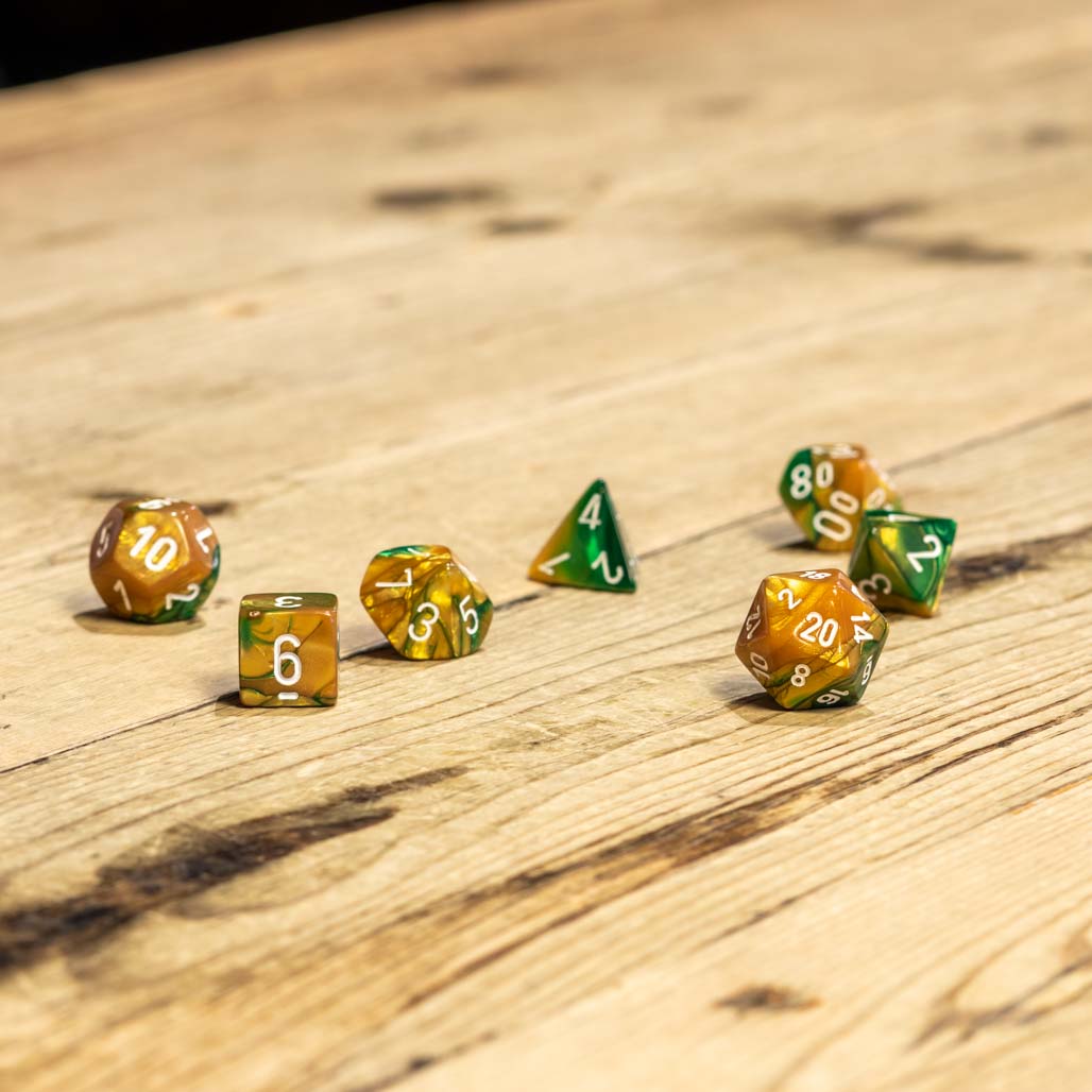 Chessex #26425 - Gemini Gold-Green / White Polyhedral (7ct)
