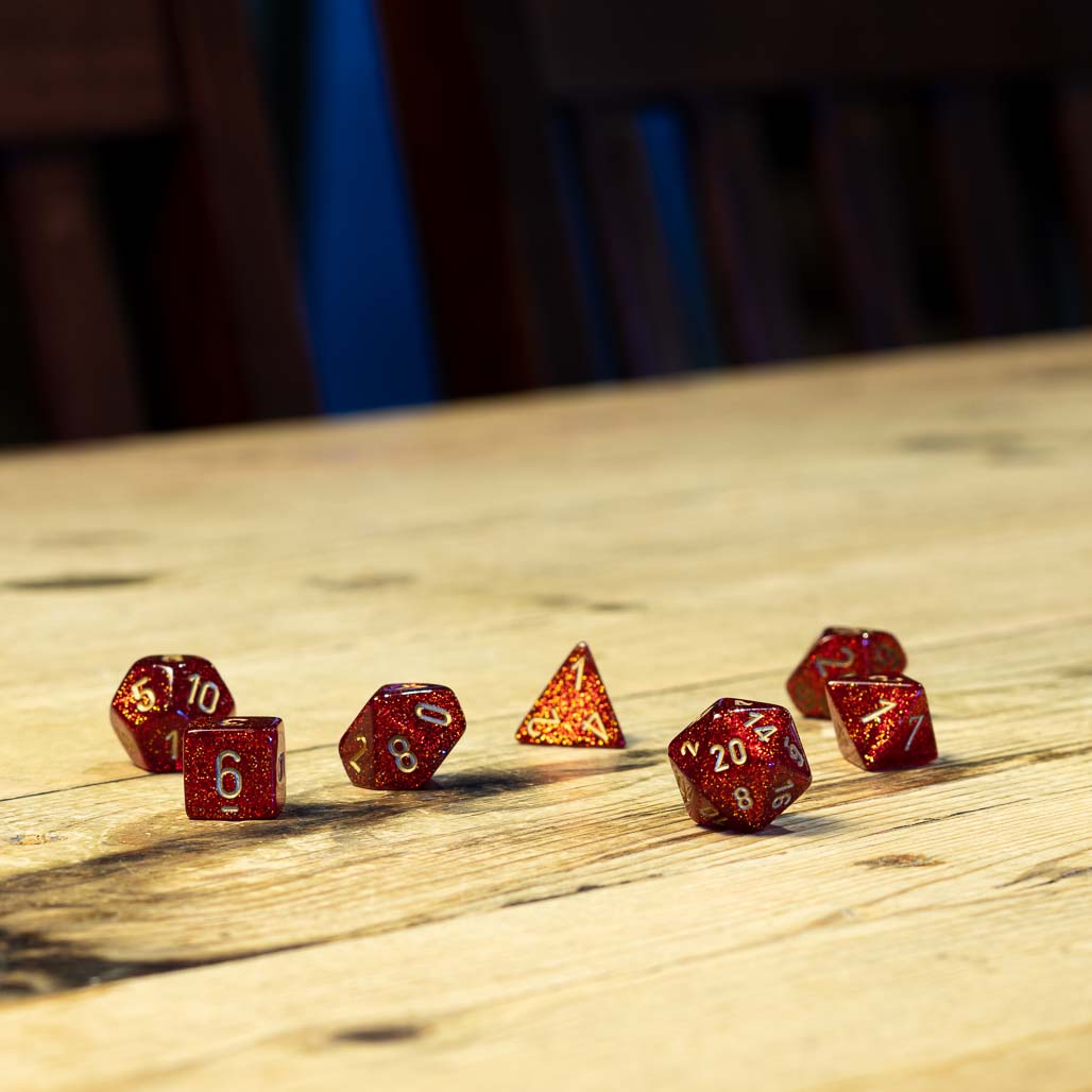 Chessex #27504 - Glitter Ruby / Gold Polyhedral (7ct)