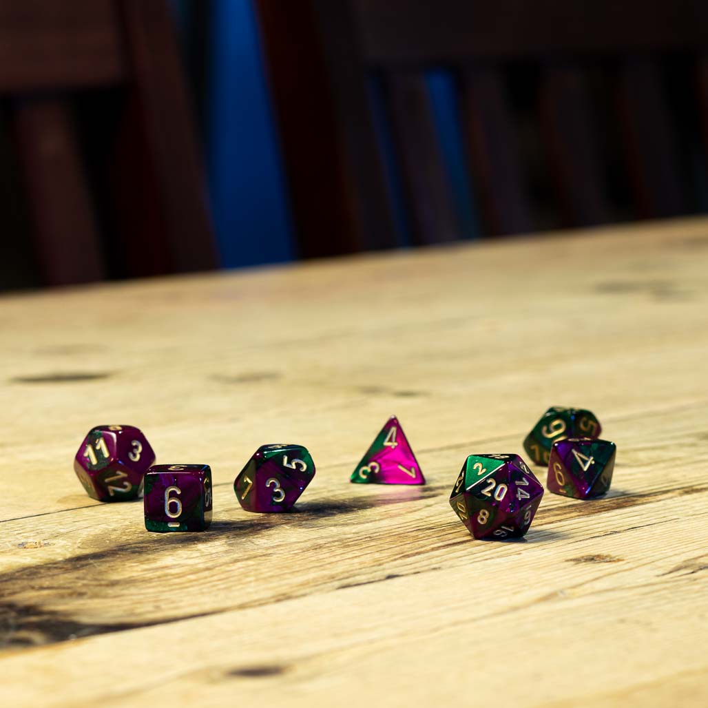 Chessex #26434 - Gemini Green-Purple / Gold Polyhedral (7ct)